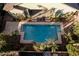 Aerial view of private pool area with desert landscaping at 3887 E Andre Ave, Gilbert, AZ 85298