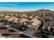 Scenic view of a single-Gathering home and desert landscaping at 3887 E Andre Ave, Gilbert, AZ 85298