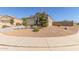 View of a single-Gathering home with desert landscaping and tile roof at 3973 N 310Th Ln, Buckeye, AZ 85396