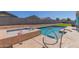 Inviting pool with a relaxing spa in a well maintained backyard at 3973 N 310Th Ln, Buckeye, AZ 85396