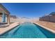 Sparkling swimming pool with clear blue water in backyard at 3973 N 310Th Ln, Buckeye, AZ 85396