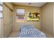 Simple bedroom with a single bed and a closet at 41124 W Rio Bravo Dr, Maricopa, AZ 85138