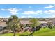 Aerial view of a backyard featuring desert landscaping and ample patio space at 42920 W Kingfisher Dr, Maricopa, AZ 85138