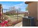 Exterior view of the backyard with desert landscaping and wrought-iron fencing at 4528 W Valencia Dr, Laveen, AZ 85339