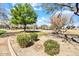 Well-maintained community park with lush greenery, walking paths, and picnic tables, fostering a welcoming environment at 4926 S Hemet St, Gilbert, AZ 85298