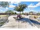 Charming community park featuring walking paths, shaded seating areas, and mature trees for leisurely outdoor activities at 4926 S Hemet St, Gilbert, AZ 85298