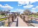 Inviting community playground with a bridge over a water feature, offering a fun and engaging outdoor space at 4926 S Hemet St, Gilbert, AZ 85298