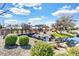 Charming community playground with a small bridge, water feature, and natural landscaping for enjoyment at 4926 S Hemet St, Gilbert, AZ 85298