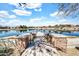 Beautiful pond view with paved entrance, landscaping, and a scenic vista in a tranquil community setting at 4926 S Hemet St, Gilbert, AZ 85298