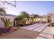 Well-designed front yard featuring desert landscaping, water feature, and elegant concrete pavers at 5101 N Casa Blanca Dr # 335, Paradise Valley, AZ 85253