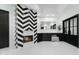 Bathroom featuring a fireplace, herringbone tile, and dual sink vanity at 5601 E Caballo Dr, Paradise Valley, AZ 85253