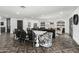 Bright, modern dining area connected to the living room, featuring a large table and stylish seating at 5601 E Caballo Dr, Paradise Valley, AZ 85253