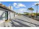 Expansive rooftop deck with stunning views of palm trees and blue skies, perfect for outdoor living at 5601 E Caballo Dr, Paradise Valley, AZ 85253