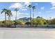 Scenic view featuring palm trees and a mountain backdrop on a sunny day at 5601 E Caballo Dr, Paradise Valley, AZ 85253