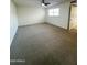 Bright bedroom featuring neutral carpet, a window with blinds and ample natural light at 5809 E Thomas Rd, Scottsdale, AZ 85251