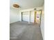 Bedroom with a built in closet and neutral color palette at 5809 E Thomas Rd, Scottsdale, AZ 85251