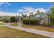 Gated community pool with manicured landscaping and lounge chairs at 5809 E Thomas Rd, Scottsdale, AZ 85251