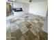 Dining area showcasing neutral tile floors and natural lighting, creating a comfortable space at 5809 E Thomas Rd, Scottsdale, AZ 85251