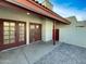 Private backyard patio area with dual doors, and concrete floor at 633 W Southern Ave # 1115, Tempe, AZ 85282