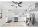 Modern kitchen featuring white cabinetry, stainless steel appliances, and tile flooring at 6808 N 33Rd Ave, Phoenix, AZ 85017