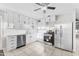 Bright kitchen with stainless steel appliances and white cabinets, offering ample storage space at 6808 N 33Rd Ave, Phoenix, AZ 85017