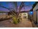 Outdoor space featuring potted plants, brick patio and an open entrance to the interior at 7334 N 7Th Ave, Phoenix, AZ 85021