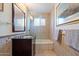 Updated bathroom with tub and tiled walls at 7334 N 7Th Ave, Phoenix, AZ 85021