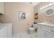 Clean bathroom with washer and dryer at 7334 N 7Th Ave, Phoenix, AZ 85021