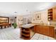 A bright kitchen with a dining area, featuring granite countertops and stainless steel appliances at 7334 N 7Th Ave, Phoenix, AZ 85021