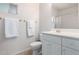 Clean bathroom featuring white cabinets, tile flooring, and a shower-tub combination at 7401 W Arrowhead Clubhouse Dr # 1052, Glendale, AZ 85308