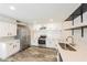 Bright kitchen features white cabinets, subway tile backsplash and stainless steel appliances at 7559 W Turquoise Ave, Peoria, AZ 85345