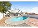 Inviting backyard pool with patio and privacy fence, perfect for relaxing and enjoying outdoor living at 7559 W Turquoise Ave, Peoria, AZ 85345