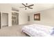 Spacious main bedroom with a private bathroom and a decorative painting at 7635 E Pampa Ave, Mesa, AZ 85212