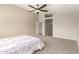 Bright main bedroom with hallway entrance to bathroom and closet at 7635 E Pampa Ave, Mesa, AZ 85212