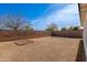 Expansive backyard with block wall fencing, providing a private and secure outdoor area for relaxation and recreation at 8567 N 107Th Dr, Peoria, AZ 85345