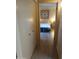 Cozy bedroom with a bed, nightstand, and matching ottomans at 8649 E Royal Palm Rd # 213, Scottsdale, AZ 85258