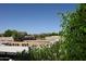 Scenic city view featuring vibrant greenery, clear blue skies and distant mountains at 8649 E Royal Palm Rd # 213, Scottsdale, AZ 85258