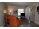 Living room features stylish leather furniture, colorful rug, and a flat screen TV at 8649 E Royal Palm Rd # 213, Scottsdale, AZ 85258