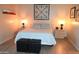 Inviting bedroom features a comfortable bed, soft lighting, and stylish décor at 8649 E Royal Palm Rd # 213, Scottsdale, AZ 85258