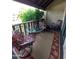 Relax on the spacious patio, furnished with comfortable chairs and a table, surrounded by lush greenery at 8649 E Royal Palm Rd # 213, Scottsdale, AZ 85258