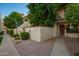 Charming condo with mature desert landscaping creating a private and inviting entrance, located near the walkway at 1017 E Maryland Ave # 110, Phoenix, AZ 85014