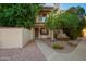 Cozy condo with a private balcony, mature trees, and easy access via the well-maintained walkway at 1017 E Maryland Ave # 110, Phoenix, AZ 85014