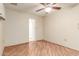 Bedroom featuring wood floors, and a ceiling fan at 10329 W Floriade Dr, Sun City, AZ 85351