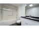 This is a bathroom with a shower-tub combo, toilet, vanity and sink at 10562 W Campana Dr, Sun City, AZ 85351