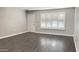 Inviting room with shuttered window and modern flooring at 10562 W Campana Dr, Sun City, AZ 85351