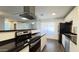 Updated kitchen with stainless steel appliances, white cabinets and plenty of counter space at 10562 W Campana Dr, Sun City, AZ 85351