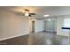 Spacious living room with modern floors, natural light and open floorplan at 10562 W Campana Dr, Sun City, AZ 85351