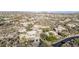 Stunning aerial view of a sprawling desert community with custom homes and scenic mountain vistas at 10638 E Hedgehog Pl, Scottsdale, AZ 85262