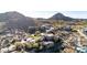 Desert home with desert landscaping, multi-level design, nestled amongst desert with mountain views at 10638 E Hedgehog Pl, Scottsdale, AZ 85262