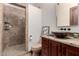 Bathroom featuring stone walk-in shower, elegant granite vanity and stylish vessel sink at 10638 E Hedgehog Pl, Scottsdale, AZ 85262